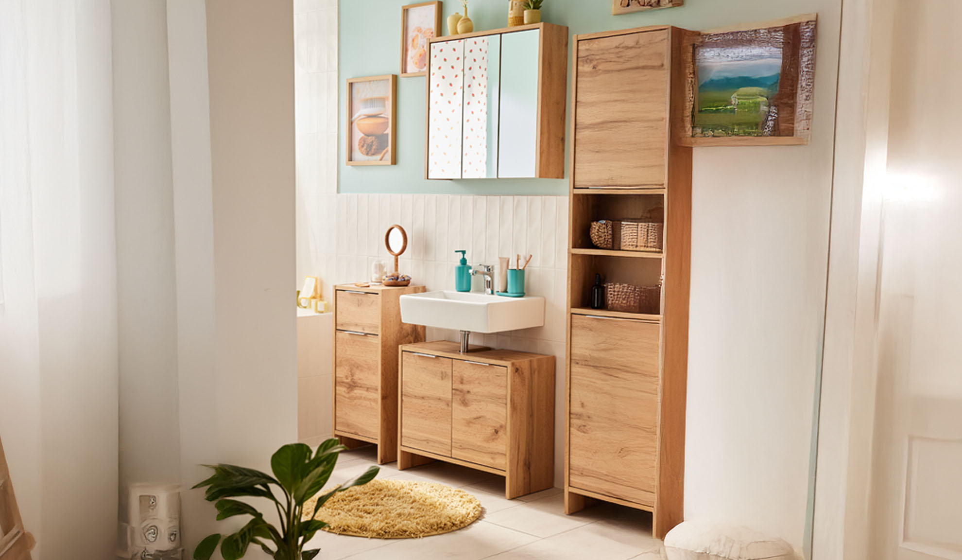 Modern bathroom with light wood furniture, white sink, and wall mirror.
