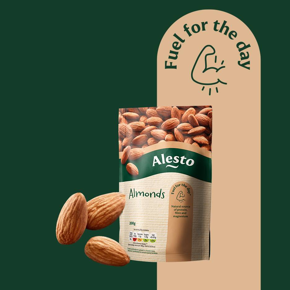 A bag of almonds with three loose almonds, and text 'Fuel for the day' with a flexing arm icon.
