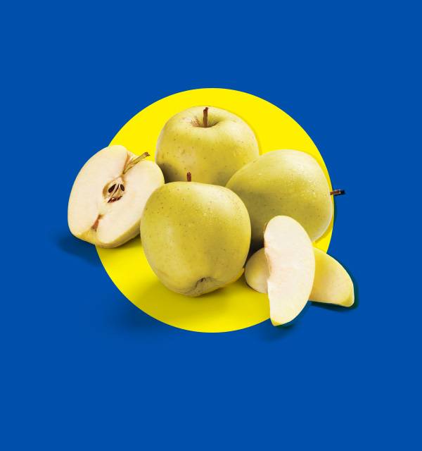 Golden apples, whole and sliced, on a yellow circle against a blue background.
