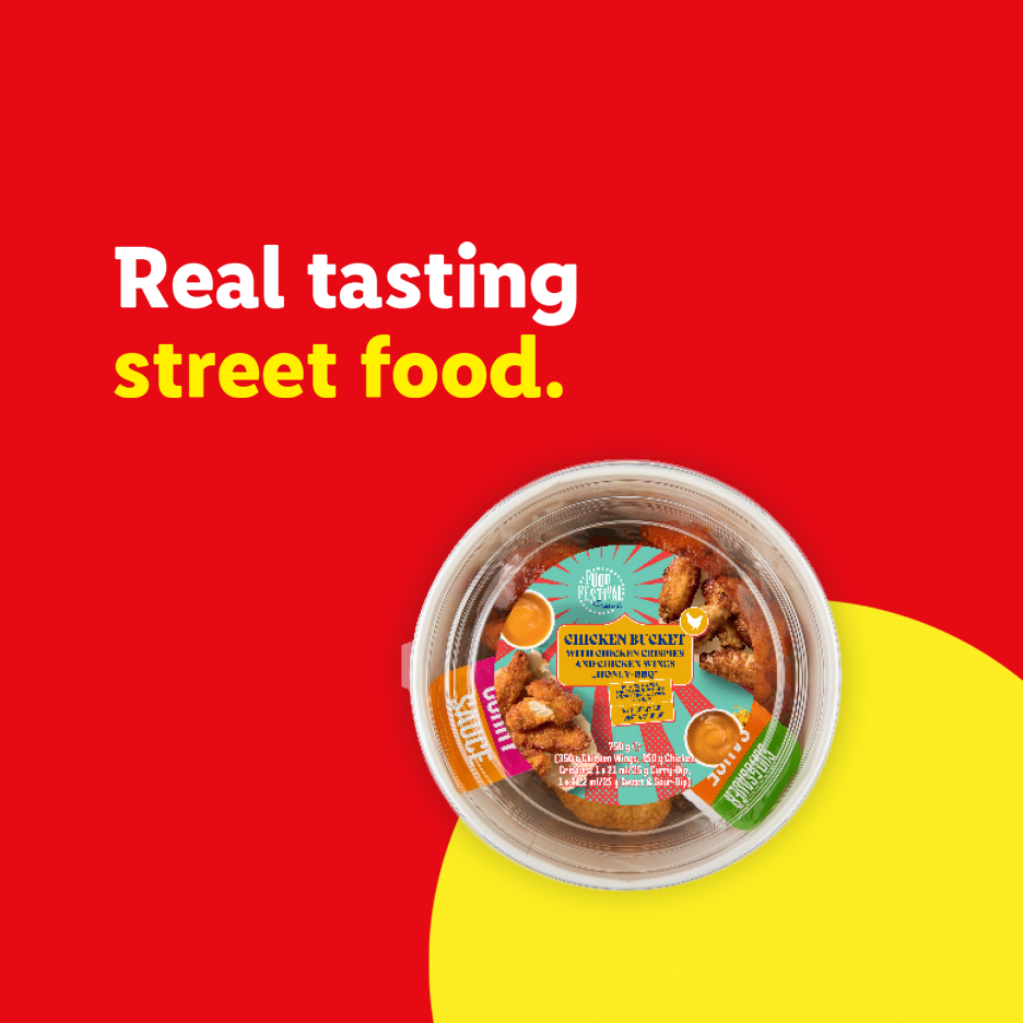 Chicken bucket with crispy chicken and wings, with the text 'Real tasting street food.'