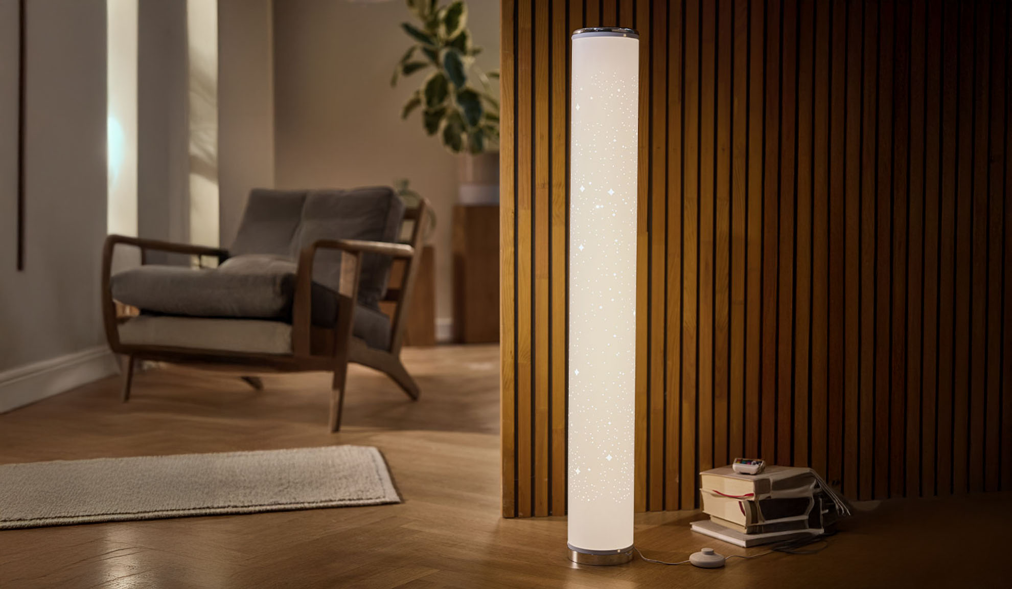 Standing lamp with star pattern in a cozy living room setting.