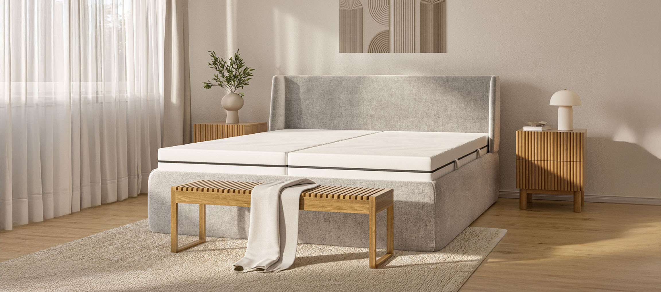 Neutral-colored bedroom with a box spring bed, wooden bench, and nightstands.