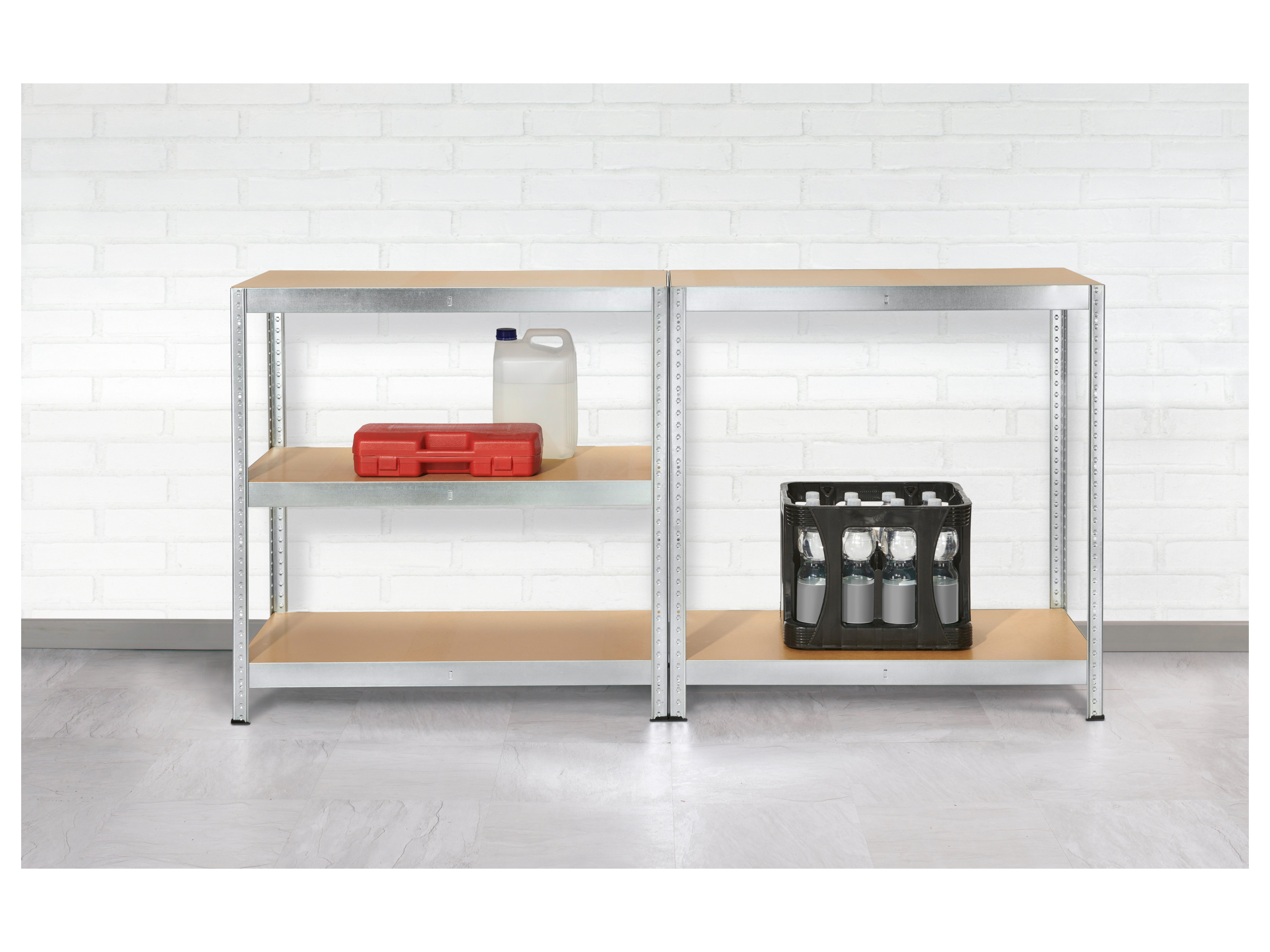 Two metal shelving units with a red toolbox, a white jug, and a crate of bottles.