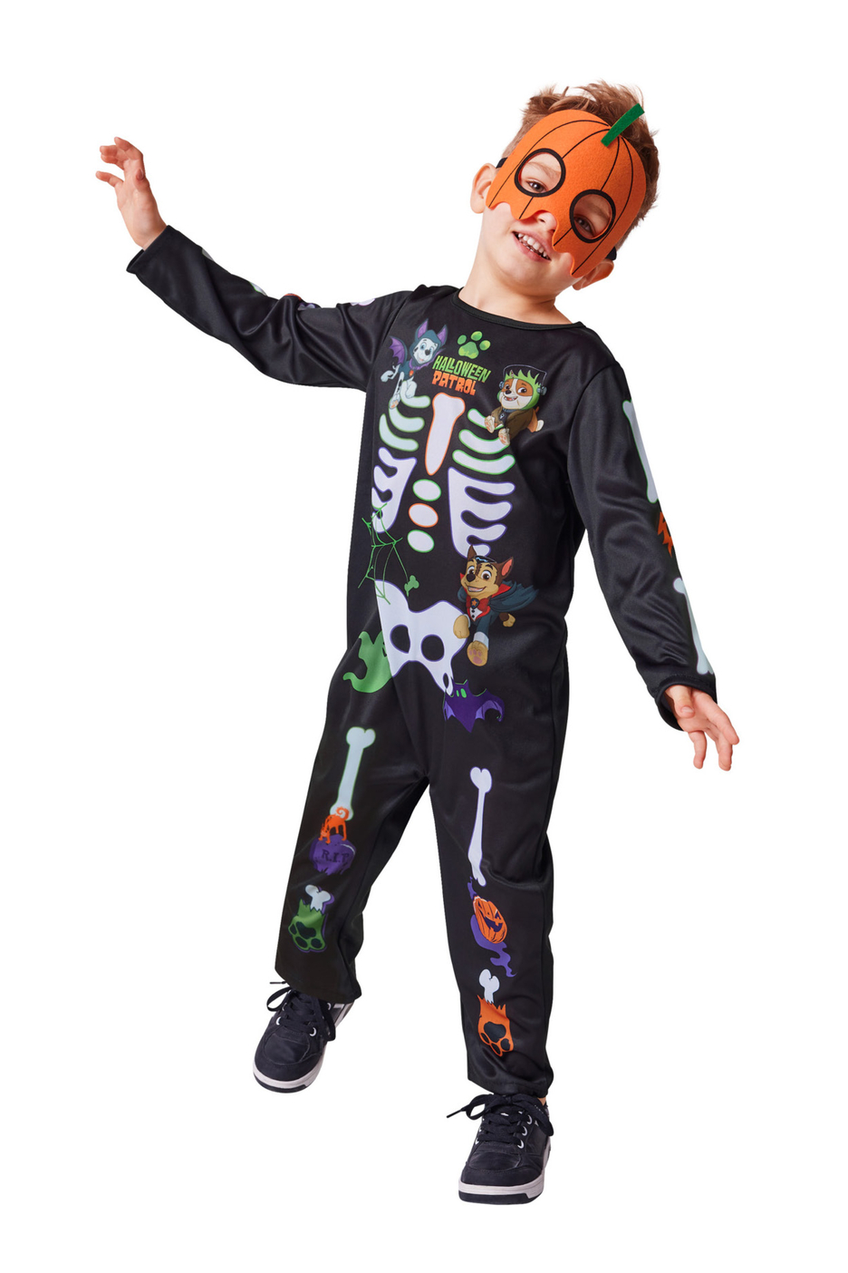 A boy in a black skeleton jumpsuit with Paw Patrol characters and a pumpkin mask.